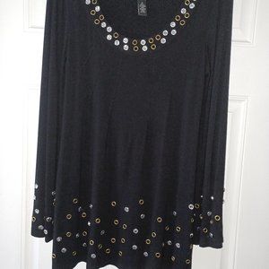Black mini dress with faux diamonds and grommets.